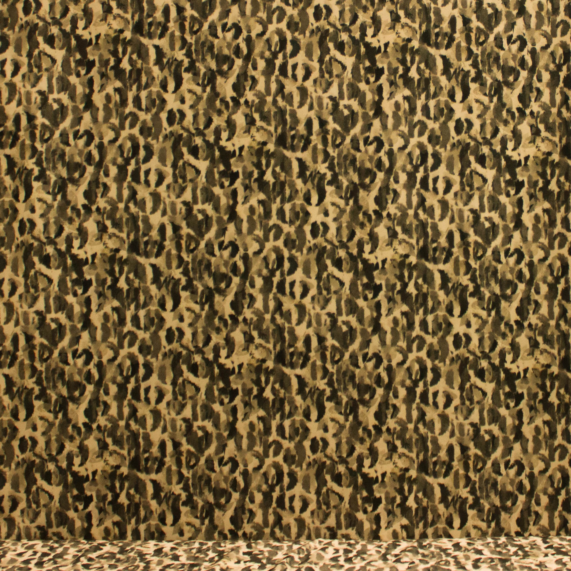 Polyester crêpe tricot beige met vlekkenpatroon
